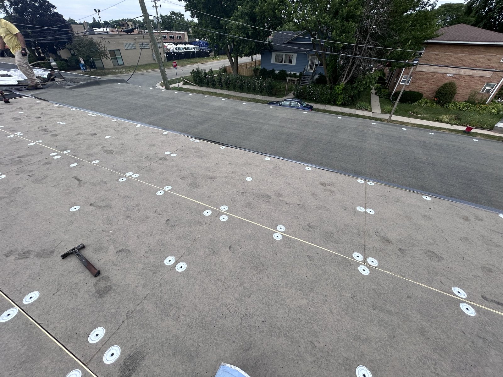 Cover board plates and cap sheet started.